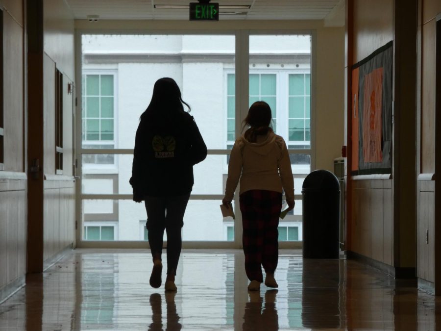 Tenth grader Chloe Pyles walking to class with eleventh grader Chyanne Johnson on the second floor of the Main building.